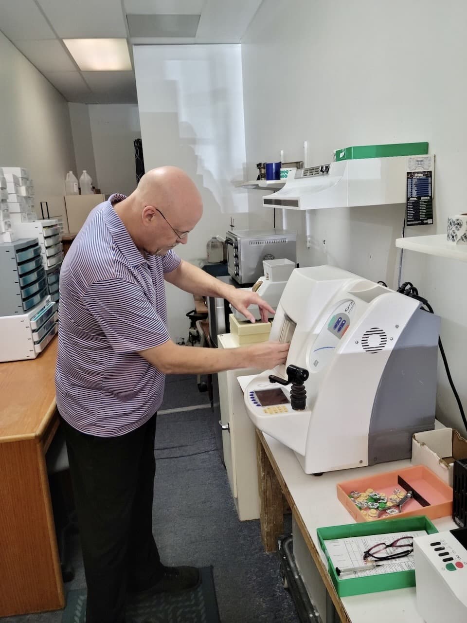 Tom Hamilton, owner of Focus Optical in Rochester Hills, MI